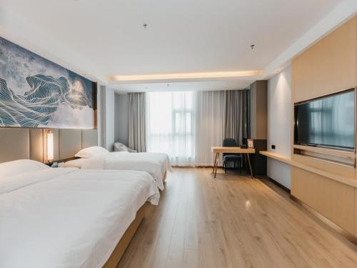 Imagen de la habitación del Hotel GreenTree Inn Jiangsu Yancheng Dongtai Overseas. Foto 16