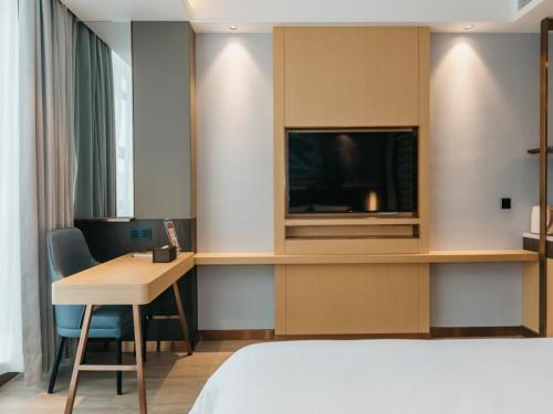 Imagen de la habitación del Hotel GreenTree Inn Jiangsu Yancheng Dongtai Overseas. Foto 17