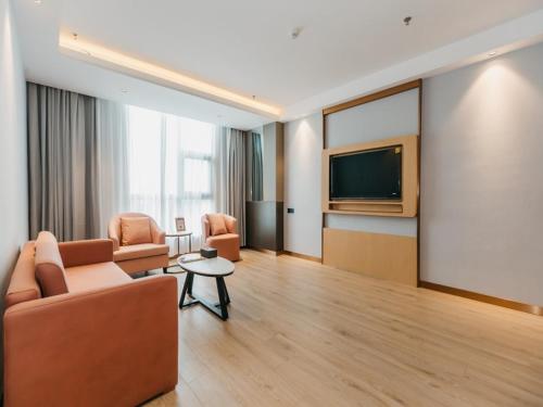 Imagen de la habitación del Hotel GreenTree Inn Jiangsu Yancheng Dongtai Overseas. Foto 18