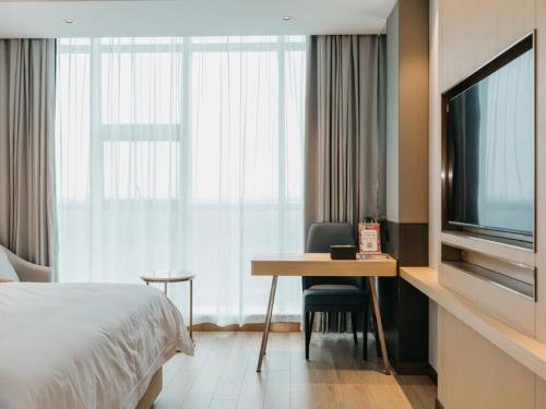 Imagen general del Hotel GreenTree Inn Jiangsu Yancheng Dongtai Overseas. Foto 12