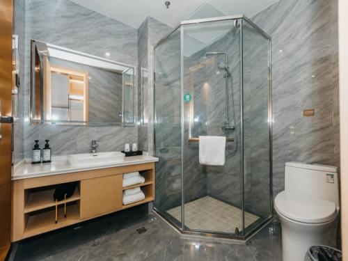 Imagen de la habitación del Hotel GreenTree Inn Jiangsu Yancheng Dongtai Overseas. Foto 19