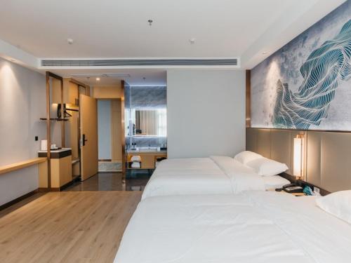 Imagen de la habitación del Hotel GreenTree Inn Jiangsu Yancheng Dongtai Overseas. Foto 20