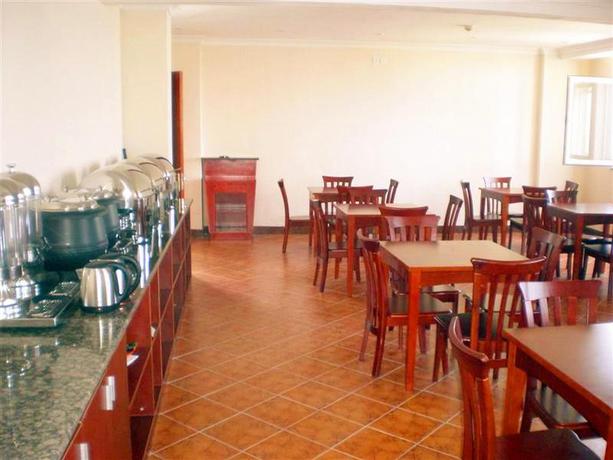 Imagen del bar/restaurante del Hotel GreenTree Inn Shandong Weihai Gangkou Express Hotel. Foto 2