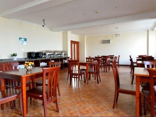 Imagen del bar/restaurante del Hotel GreenTree Inn Shandong Weihai Gangkou Express Hotel. Foto 3