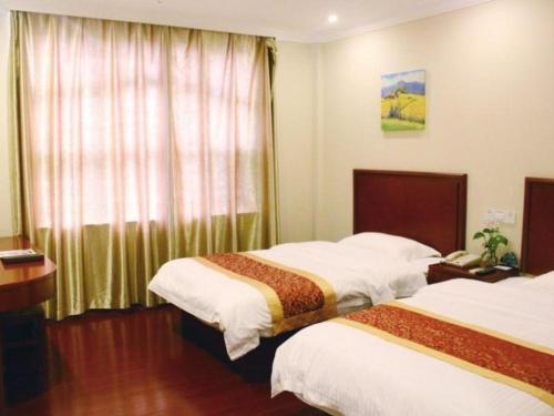 Imagen general del Hotel GreenTree Inn Shanghai MinHang ZhuanQiao Subway Station East ZhuanXing Road Shell. Foto 3