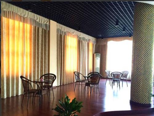 Imagen general del Hotel GreenTree Inn Shangrao Qianshan hekou old town Xinjiang longting shell hotel. Foto 3