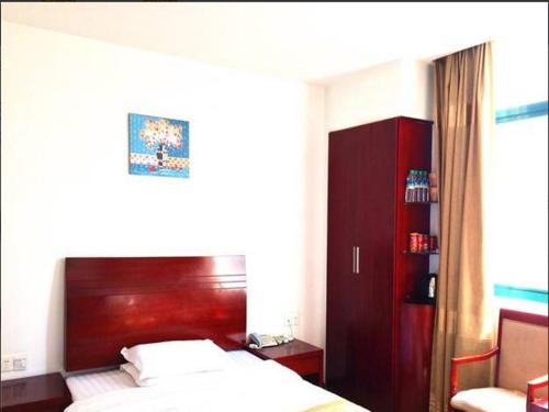 Imagen general del Hotel GreenTree Inn Shangrao Qianshan hekou old town Xinjiang longting shell hotel. Foto 8