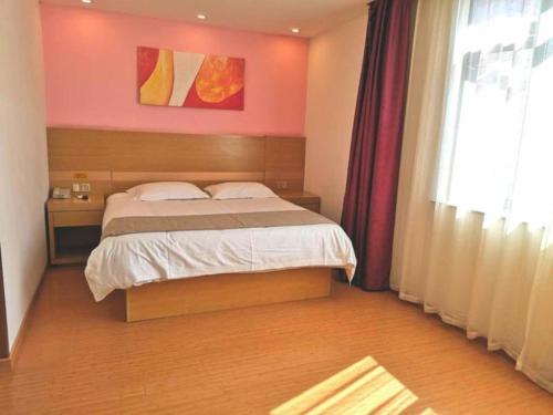 Imagen general del Hotel GreenTree Inn Shangrao Qianshan hekou old town Xinjiang longting shell hotel. Foto 10