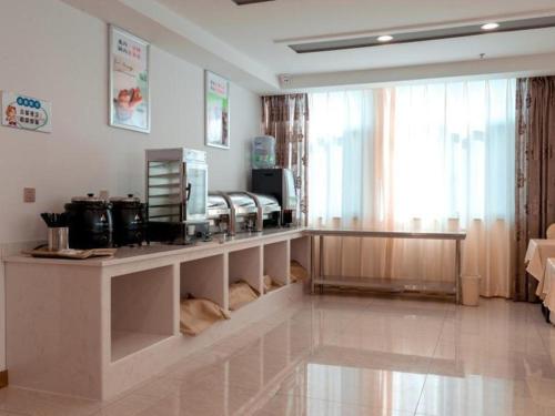 Imagen general del Hotel GreenTree Inn Suzhou Zhangjiagang Tangshi Town Yangzi Road Express. Foto 10
