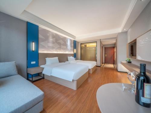 Imagen general del Hotel GreenTree Inn Yulin Hongjin Markey Yide. Foto 1