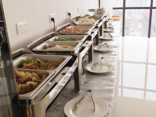 Imagen general del Hotel GreenTree Inn Zhengzhou Xinzheng City Longhu Town Xiangyun Road Express. Foto 4