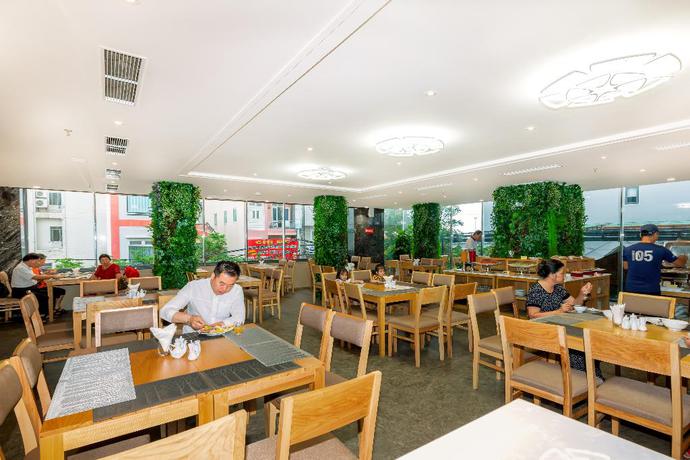 Imagen del bar/restaurante del Hotel Greenery. Foto 9