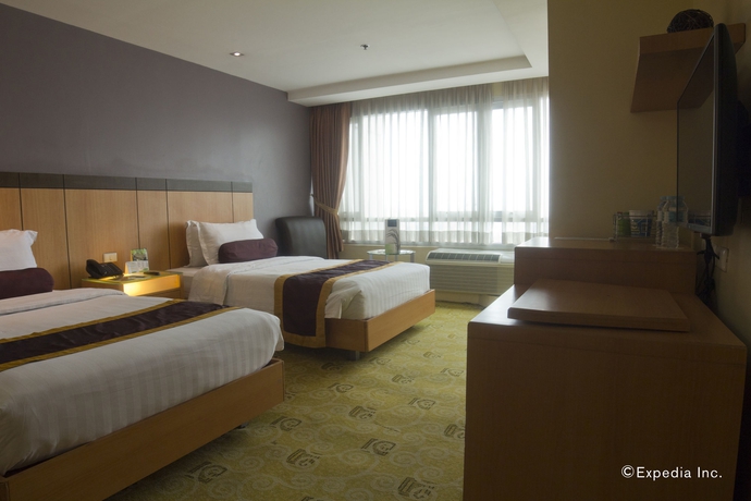 Imagen de la habitación del Hotel Greenhills Elan Modern. Foto 10