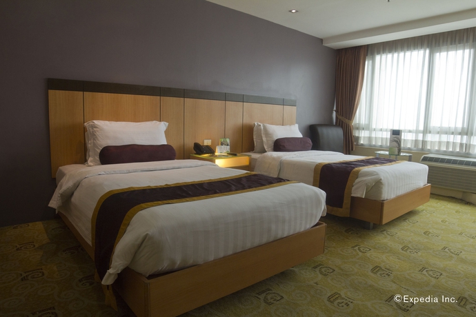 Imagen de la habitación del Hotel Greenhills Elan Modern. Foto 11