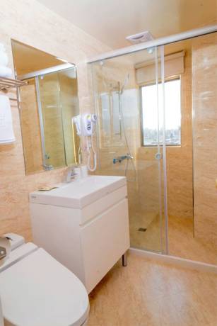 Imagen de la habitación del Hotel Greeninn. Foto 5