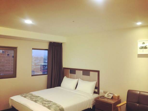 Imagen de la habitación del Hotel Greeninn. Foto 6