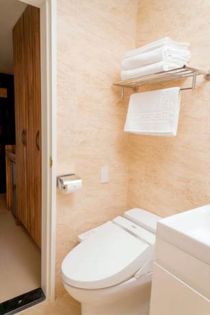 Imagen de la habitación del Hotel Greeninn. Foto 8