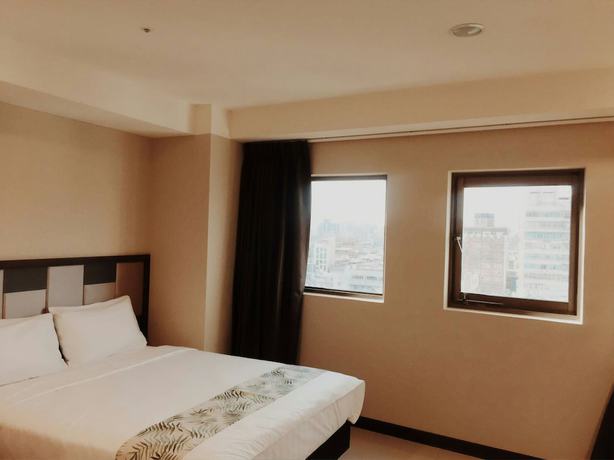 Imagen de la habitación del Hotel Greeninn. Foto 13