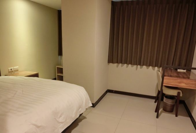 Imagen de la habitación del Hotel Greeninn. Foto 14
