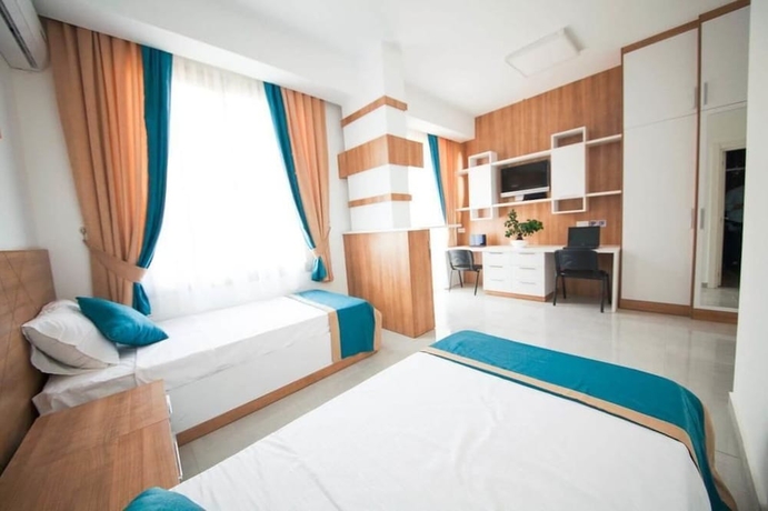 Imagen de la habitación del Hotel Greenland Premium Residence. Foto 5