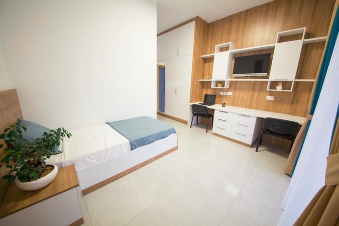 Imagen de la habitación del Hotel Greenland Premium Residence. Foto 8