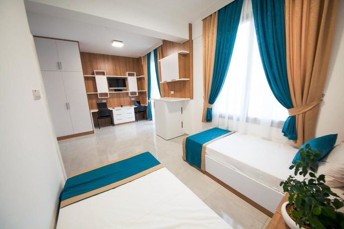 Imagen de la habitación del Hotel Greenland Premium Residence. Foto 9