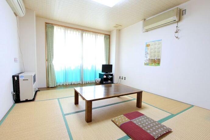 Imagen de la habitación del Hotel Greenpark Morinoizumi. Foto 19