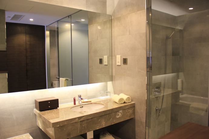 Imagen de la habitación del Hotel Greenpark Tianjin. Foto 2