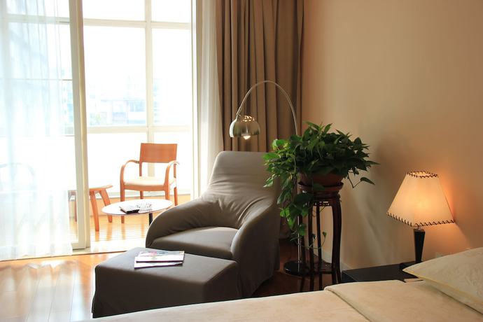 Imagen de la habitación del Hotel Greenpark Tianjin. Foto 5