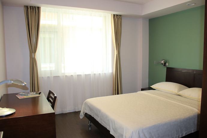 Imagen de la habitación del Hotel Greenpark Tianjin. Foto 6