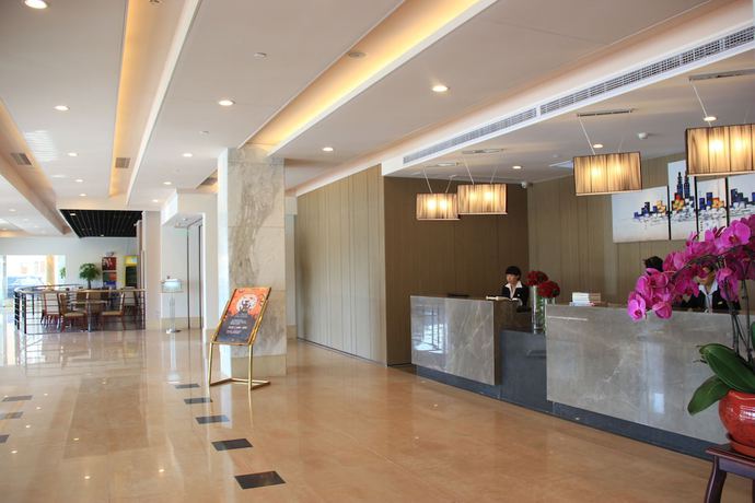 Imagen de los interiores del Hotel Greenpark Tianjin. Foto 18