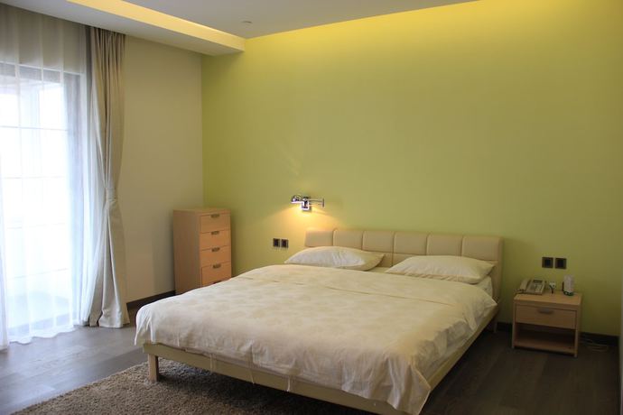 Imagen de la habitación del Hotel Greenpark Tianjin. Foto 15