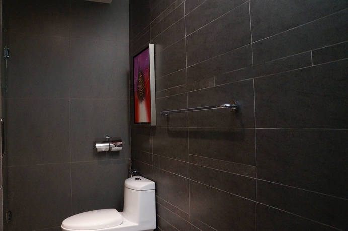Imagen de la habitación del Hotel Greens And Suites. Foto 18