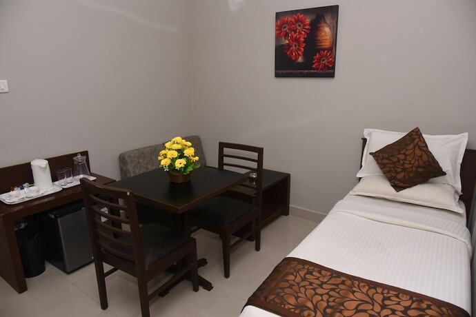 Imagen de la habitación del Hotel Greens Gate. Foto 22