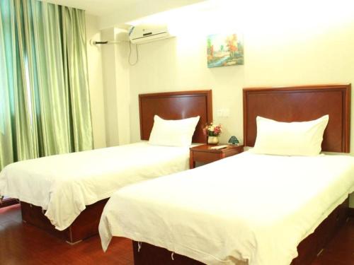 Imagen de la habitación del Hotel Greentree Alliance Shanghai Hongqiao Railway Stati. Foto 5