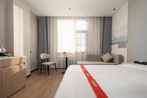 Imagen de la habitación del Hotel Greentree Eastern Tengchong. Foto 15