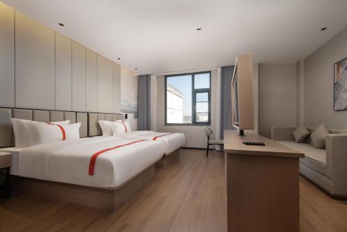 Imagen de la habitación del Hotel Greentree Eastern Tengchong. Foto 17