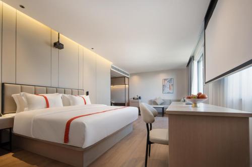 Imagen de la habitación del Hotel Greentree Eastern Tengchong. Foto 19