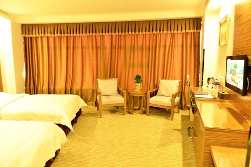 Imagen de la habitación del Hotel Greentree Eastern Xinyu Yushui District Xinyu Bridge South Xinxin Avenue. Foto 5