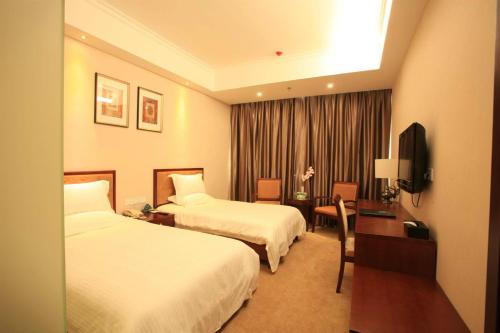 Imagen de la habitación del Hotel Greentree Inn Beijing Daxing Xingye Street Liyuan. Foto 6
