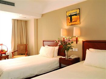 Imagen de la habitación del Hotel Greentree Inn Beijing Guangmingqiao Express Apartment. Foto 9