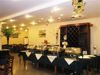 Imagen del bar/restaurante del Hotel Greentree Inn Beijing Guangmingqiao Express Apartment. Foto 7