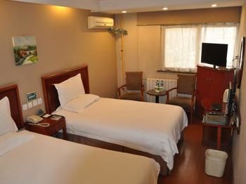 Imagen de la habitación del Hotel Greentree Inn Beijing Guangmingqiao Express Apartment. Foto 13