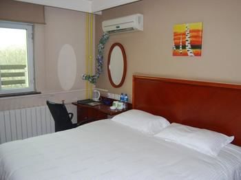 Imagen de la habitación del Hotel Greentree Inn Beijing Guangmingqiao Express Apartment. Foto 14