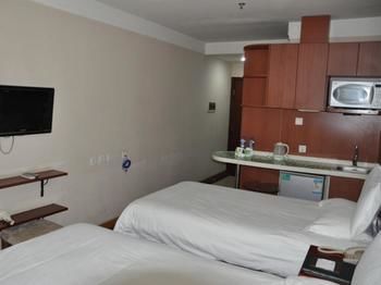 Imagen de la habitación del Hotel Greentree Inn Beijing Guangmingqiao Express Apartment. Foto 16