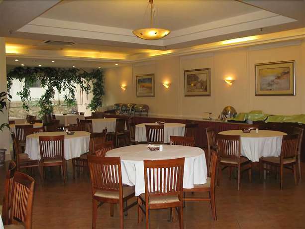 Imagen del bar/restaurante del Hotel Greentree Inn Guangdong Shenzhen Dongmen Business. Foto 3