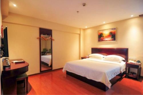 Imagen de la habitación del Hotel Greentree Inn Hainan Haikou Haifu Road Provincial. Foto 6