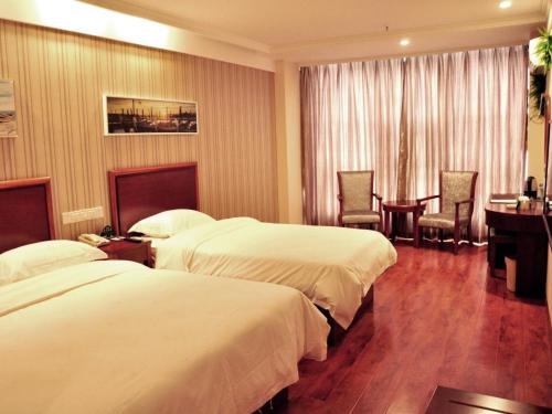 Imagen de la habitación del Hotel Greentree Inn Hefei Silihe Road Shuimu Spring City. Foto 7