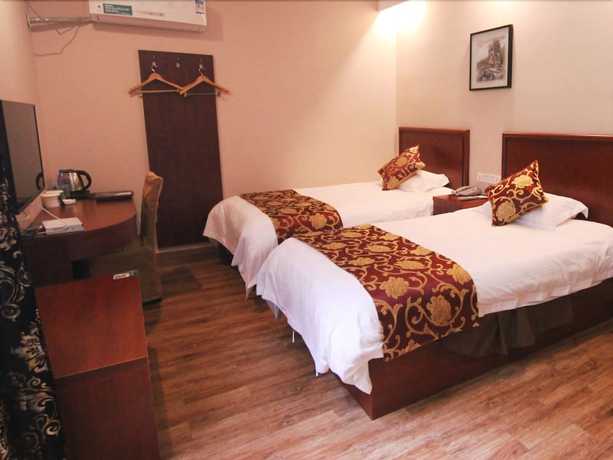 Imagen de la habitación del Hotel Greentree Inn Huangshan Tangkou Town Scenic Spot South Gate Transfer Center. Foto 6