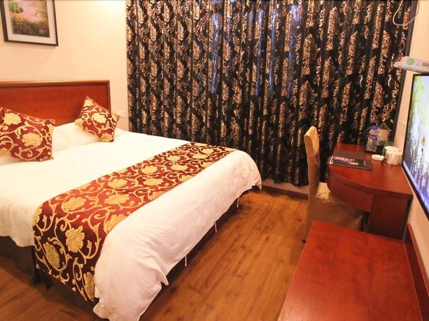 Imagen de la habitación del Hotel Greentree Inn Huangshan Tangkou Town Scenic Spot South Gate Transfer Center. Foto 7